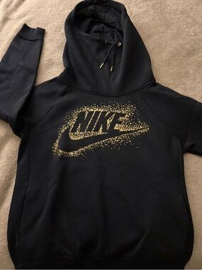 Nike Black hoodie with gold emblem
